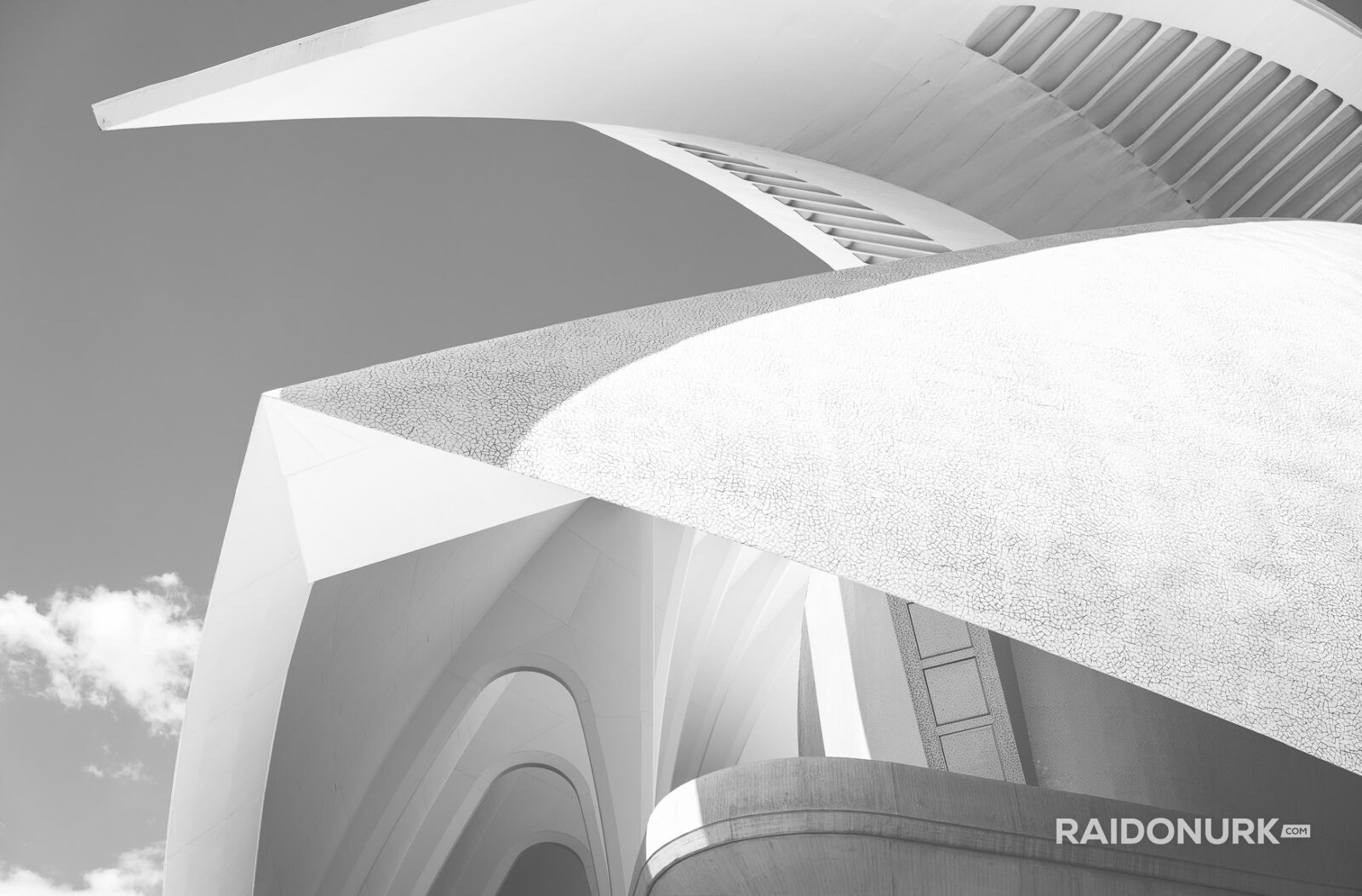 best places to photograph in Valencia, must-see architecture in Spain, unique buildings in Europe, Valencia cityscape, architectural landmarks in Valencia, Instagrammable places in Valencia, minimalist architecture, abstract architecture, geometric design, architectural details, high contrast photography, surreal photography, bright sky architecture, clean lines, creative perspective, Valencia architecture, Spain architecture, modern architecture, futuristic buildings, City of Arts and Sciences, Santiago Calatrava, architectural photography, contemporary design, urban landscape, iconic buildings