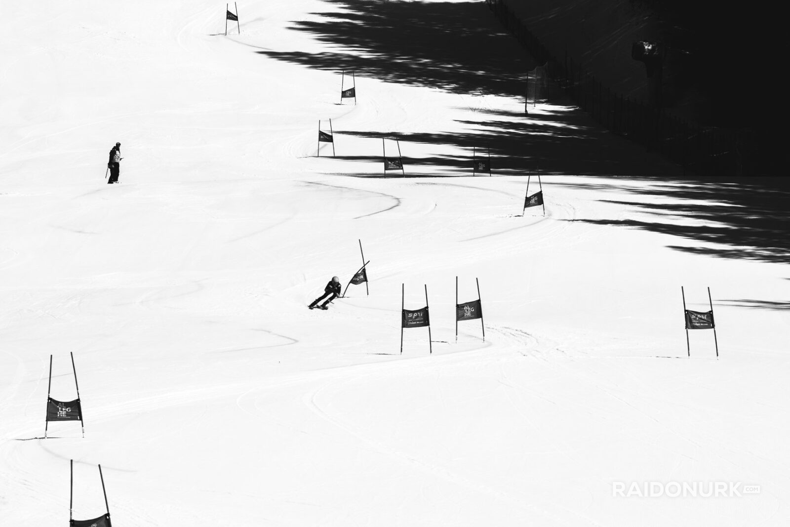 ski racing photography, Dolomites winter, alpine skiing art, black and white snow photography, Raido Nurk, ski gates photo series, winter minimalism, fine art ski photo, shadow play in snow