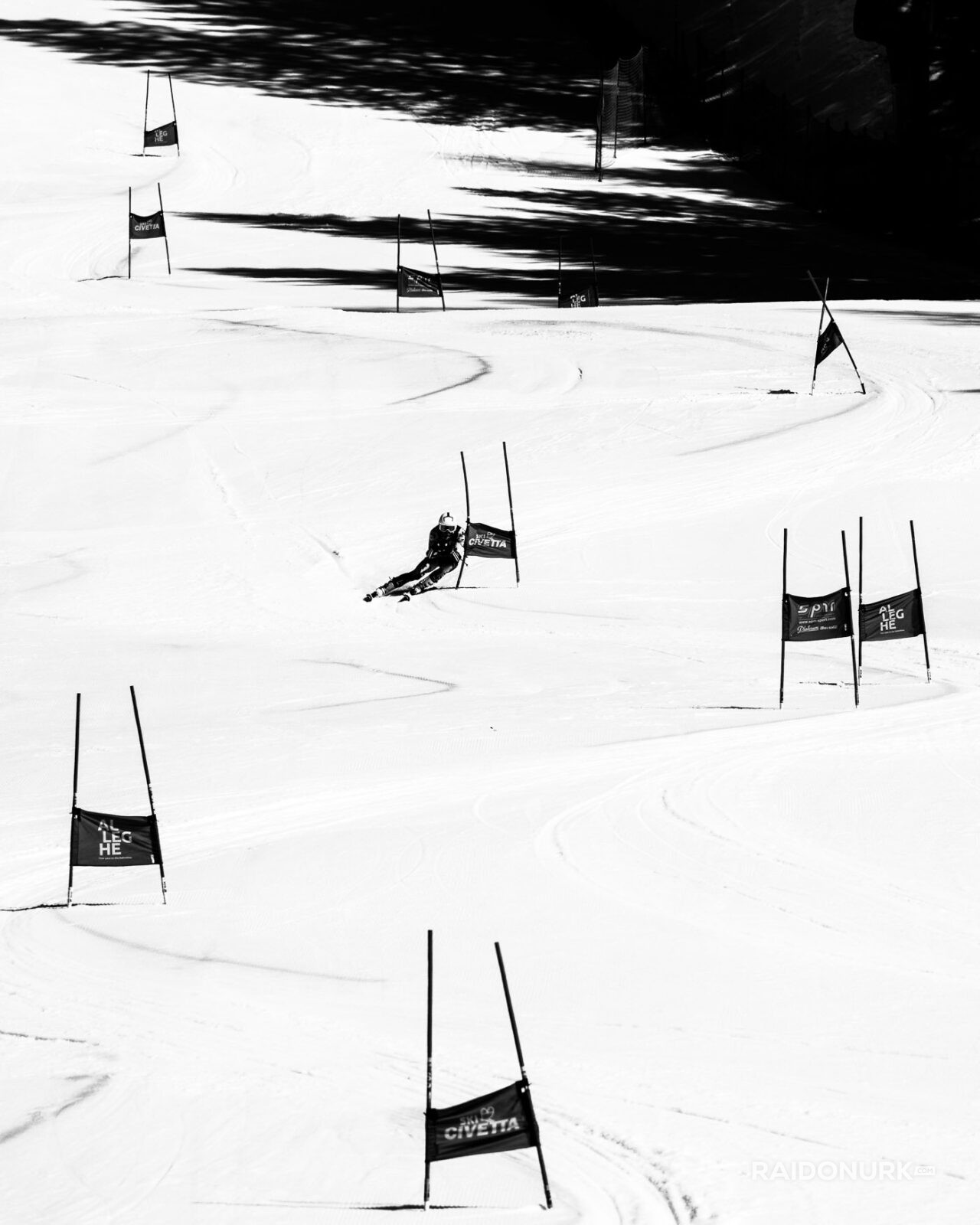ski racing photography, Dolomites winter, alpine skiing art, black and white snow photography, Raido Nurk, ski gates photo series, winter minimalism, fine art ski photo, shadow play in snow