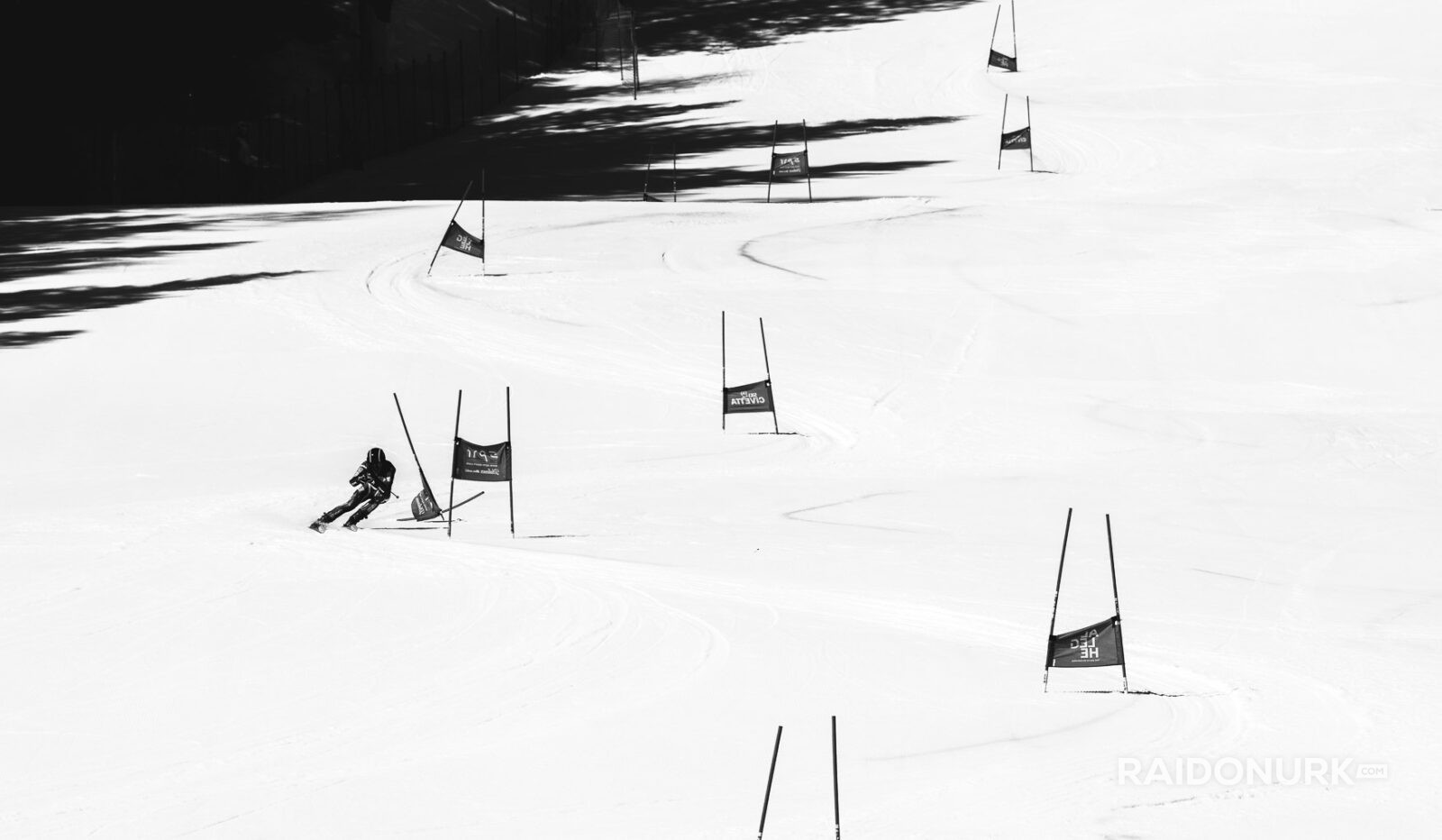 ski racing photography, Dolomites winter, alpine skiing art, black and white snow photography, Raido Nurk, ski gates photo series, winter minimalism, fine art ski photo, shadow play in snow